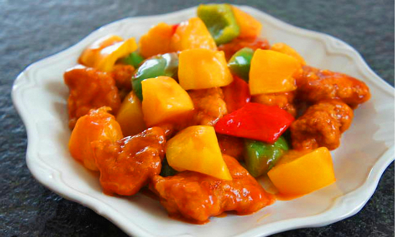 菠萝咕咾肉 Свинина в кляре с ананасом в кисло-сладком соусе